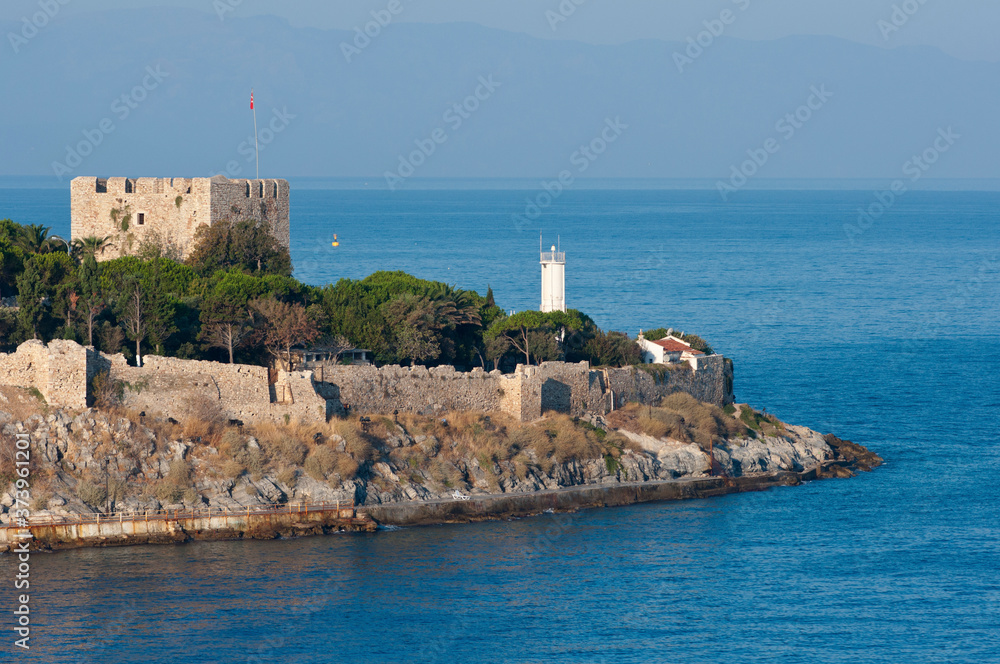Turkey, Kusadasi. Tiny island of Guvercin Adasi (aka Dove Island) in the Aegean Sea, 14th-15th century fortress.