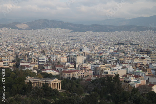 Greek temple over modern Athens © David