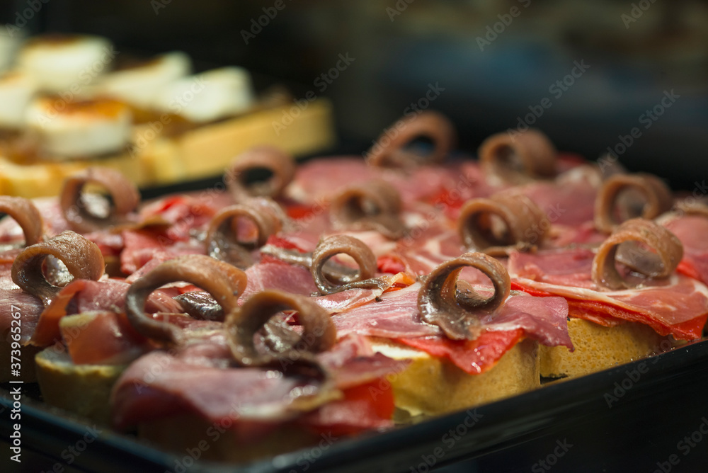 Obraz premium Tapas for sale in Madrid San Miguel market. Spain.