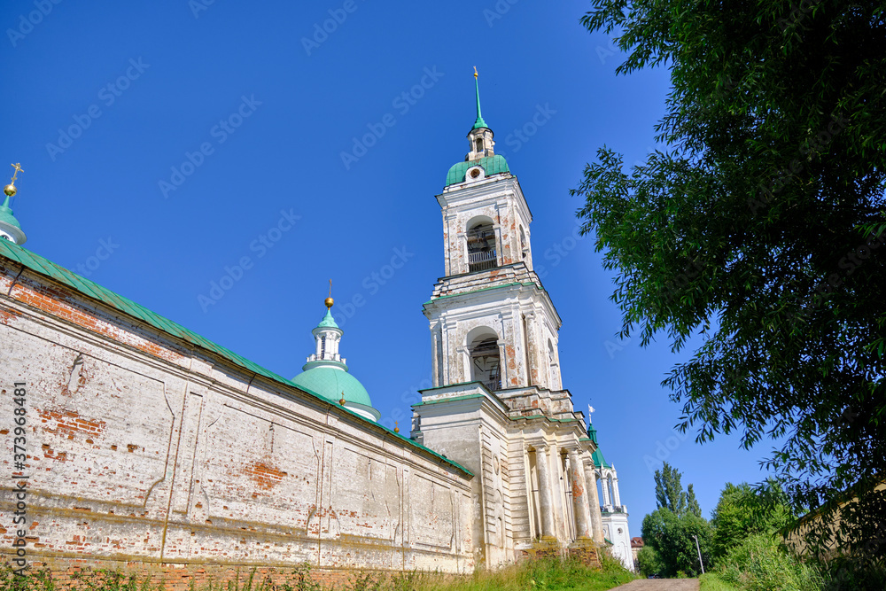 Scenic view of old Spasso-Yakovlevsky Monastery (Monastery of St. Jacob Saviour) in Rostov Veliky in Yaroslavl Oblast in Russian Federation. Beautiful summer sunny look of orthodox temple Scenic view of old Spasso-Yakovlevsky Monastery (Monastery of St. Jacob Saviour) in Rostov Veliky in Yaroslavl Oblast in Russian Federation. Beautiful summer sunny look of orthodox temple