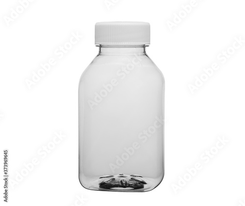 Clear empty plastic pill bottle. Isolated on a white background, close-up