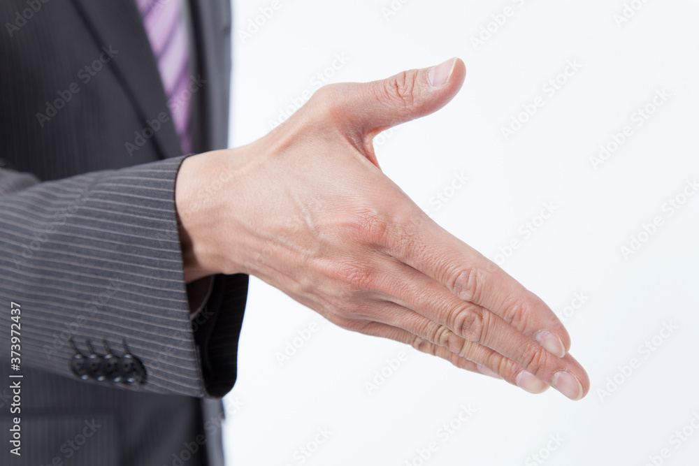 Obraz premium 握手するビジネスマン