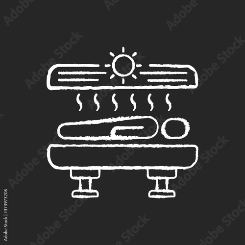 Tanning chalk white icon on black background. Solarium. Indoor tanning and sunbathing. Sunbed. Spa salon tanning machines for procedures. Isolated vector chalkboard illustration