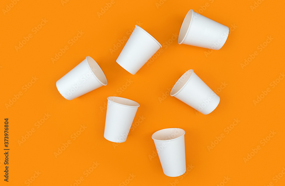 White paper cups on orange backdrop. Ecology. Zero waste, recycling concept. Mock up template. Flat lay view. White paper cups on orange backdrop. Ecology. Zero waste, recycling concept. Mock up template. Flat lay view.
