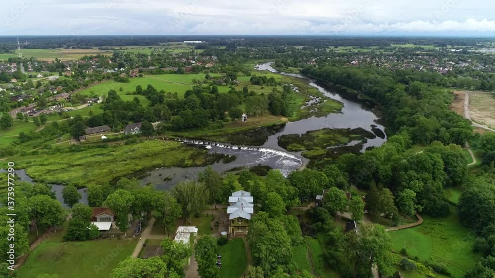 Venta Rumba is the widest waterfall in Europe. The Venta River is located in Kuldiga. Summer sunny weather Venta Rumba is the widest waterfall in Europe. The Venta River is located in Kuldiga. Summer sunny weather