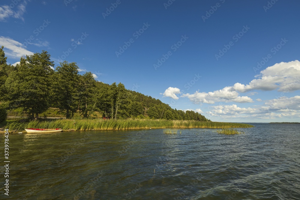 Beautiful Baltic sea view  on blue sky with white clouds background. Beautiful summer nature backgrounds.  Sweden, Europe.