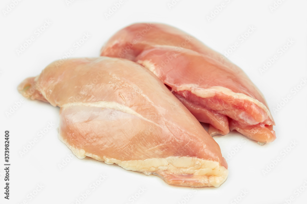 piece of chicken breast, raw filet meat, isolated on white piece of chicken breast, raw filet meat, isolated on white