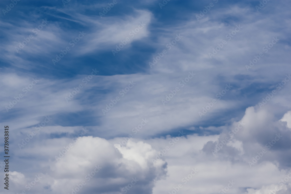 Beautiful clear pieceful blue sky with clouds and sun Beautiful clear pieceful blue sky with clouds and sun