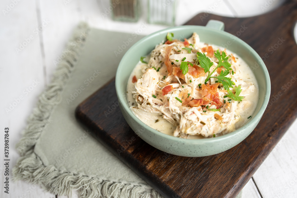 Shredded chicken in cream cheese sauce and bacon cooked in slow cooker Shredded chicken in cream cheese sauce and bacon cooked in slow cooker