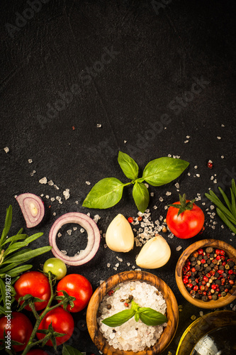 Food cooking background at black top view.