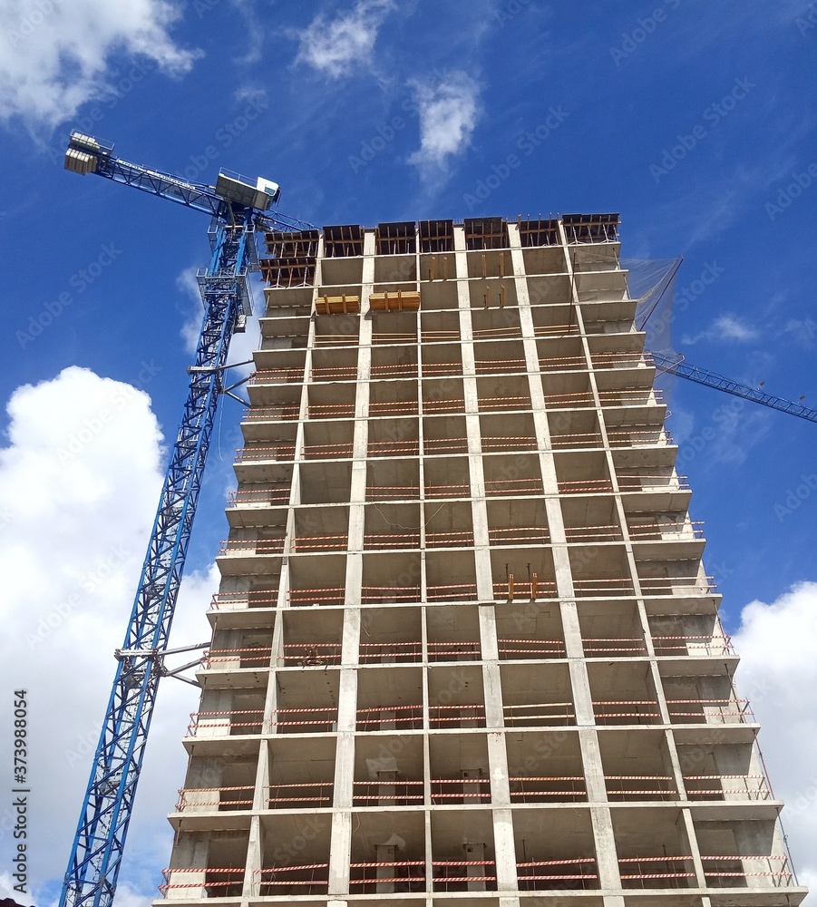 construction of a modern high-rise building
construction of a modern high-rise building