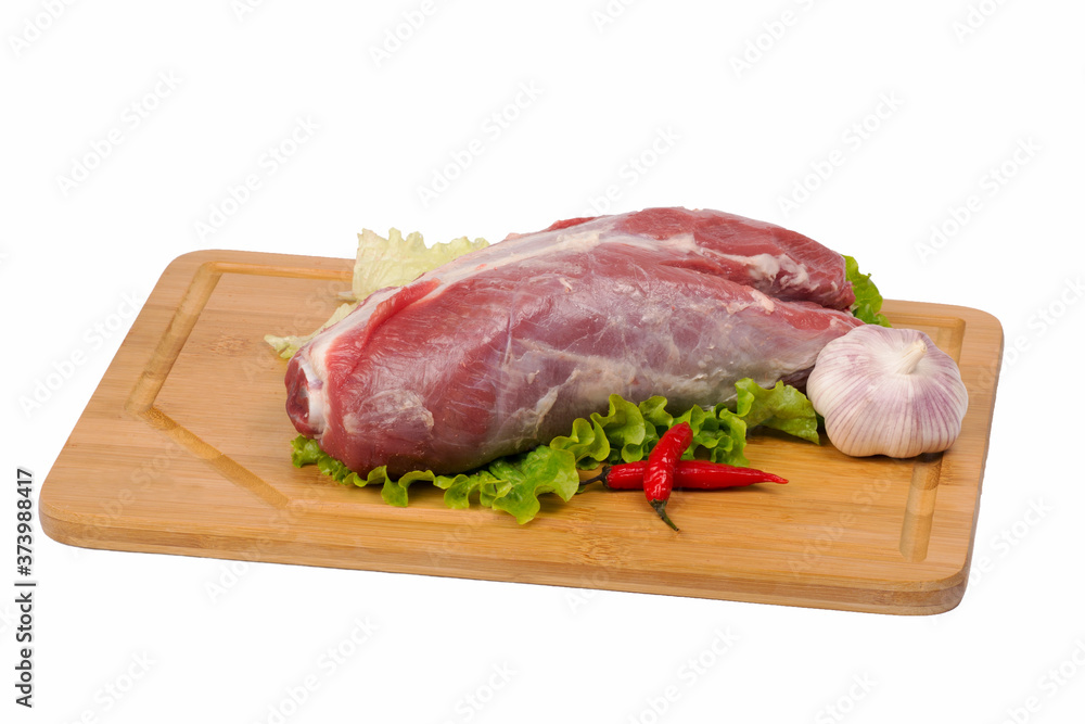 fresh and raw beef meat on cutting board on white background fresh and raw beef meat on cutting board on white background