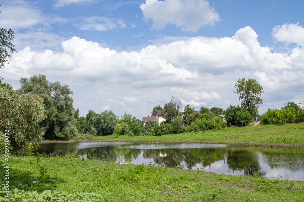 Lake in the village in summer. Gomel. Belarus