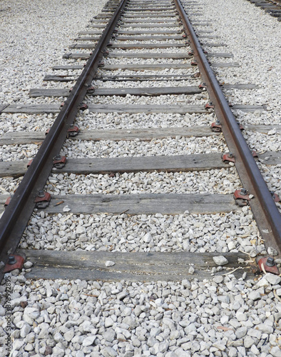 Old railway tracks leading to vanishing point