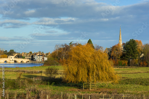 River Great Ouse with the medieval St Leger Chapel Bridge at St Ives in Cambridgeshire, UK. photo