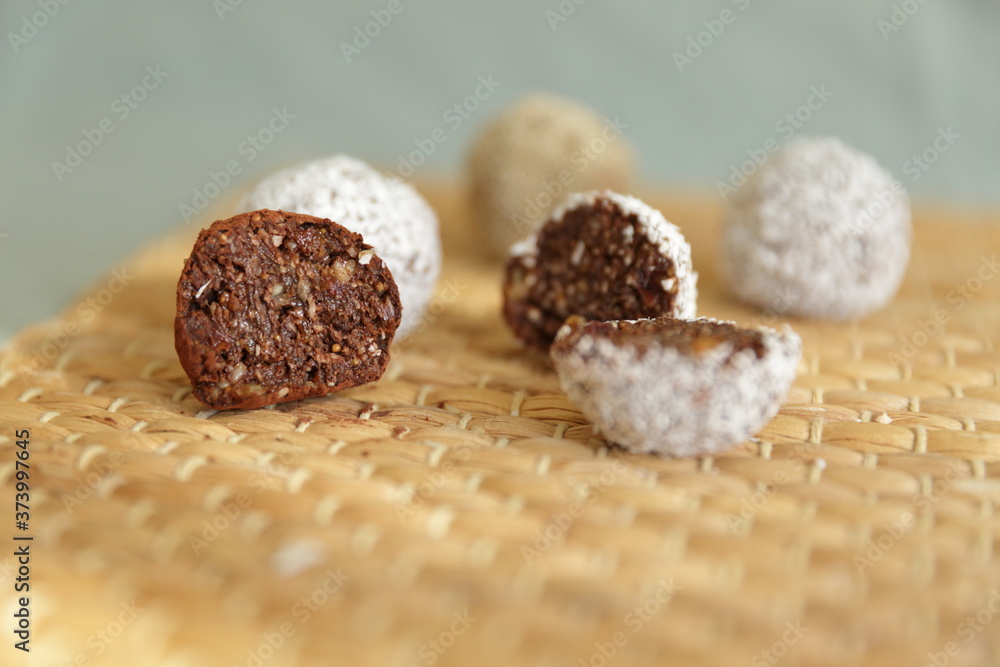 Homemade vegan candies on clear background without sugar Homemade vegan candies on clear background without sugar