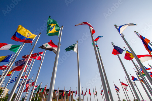Multinational - Upward view of the flags in the Global Citizens Plaza.  Chapman University, Orange, California, USA