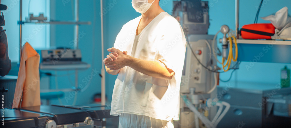 white uniform of surgeon doctor in operating room white uniform of surgeon doctor in operating room