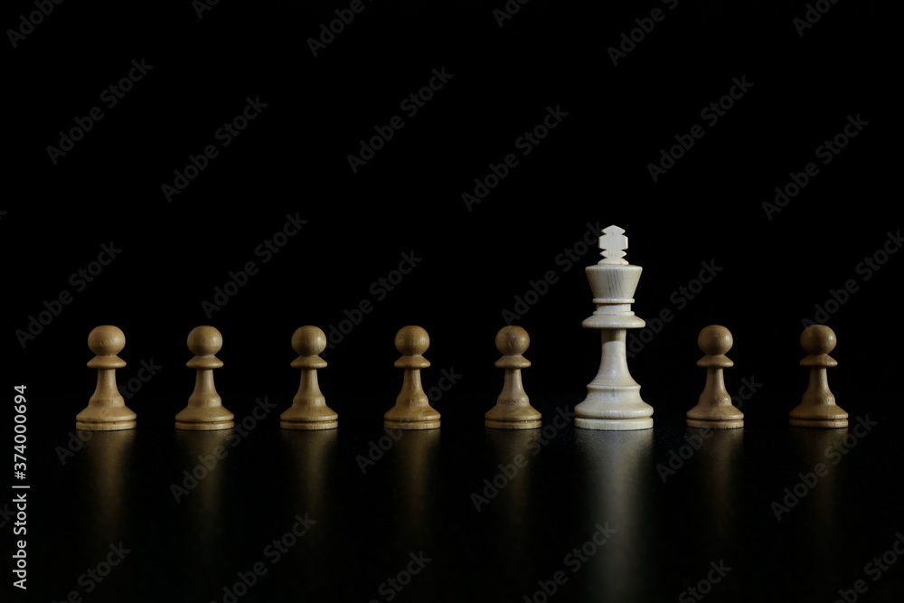 chess pieces on black background chess pieces on black background