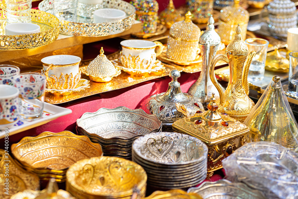 Metal bowls, dishes in market traditional Asian turkish bowls kitchenwear in silver and golden metal