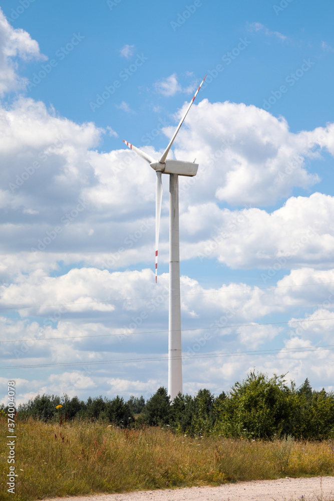 Wind farm close-up against the sky.