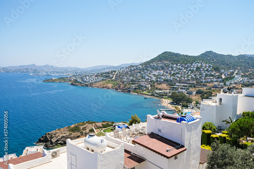 white holiday villas houses on resort with sea city view © olga_demina
