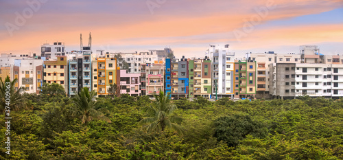 Bangalore, Karnataka, India - December,12, 2015: Colorful homes built with plaster in suburban Bangalore city in the morning time