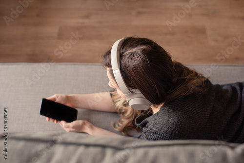 Φωτογραφία Woman listening music in headphones