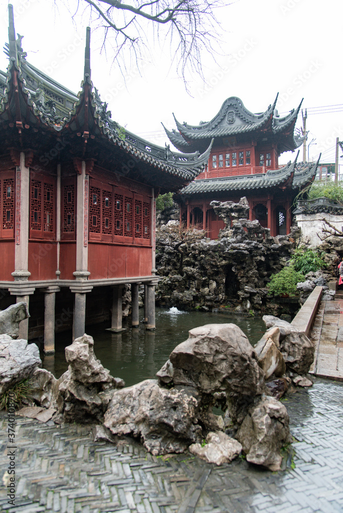 Fototapeta premium Shanghai. February 2019. Yuyuan Garden Yuyuan Garden is a refined garden located north-east of the old city of Shanghai, which houses pavilions, ponds, rocks and enchanting views.