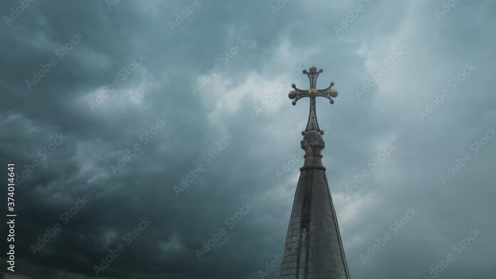Storm clouds overhead of the church tower Storm clouds overhead of the church tower