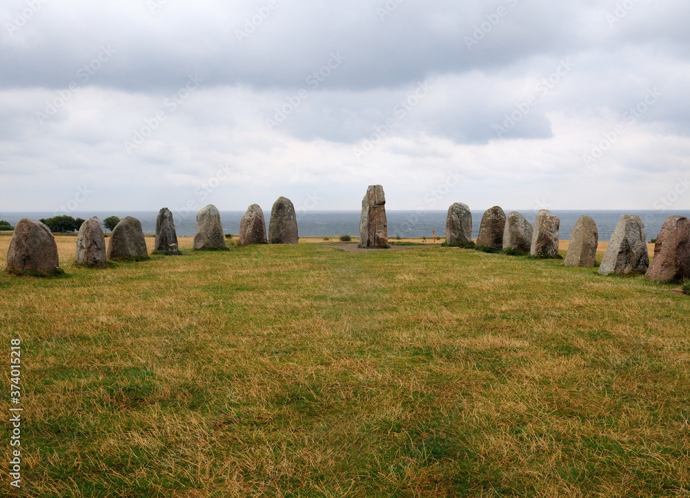 Ring Of Standing Stones Ales Stenar in Kaseberga graves On A Cloudy Summer Day