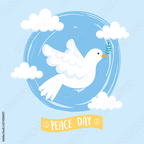international peace day white pigeon holding branch flying sky clouds