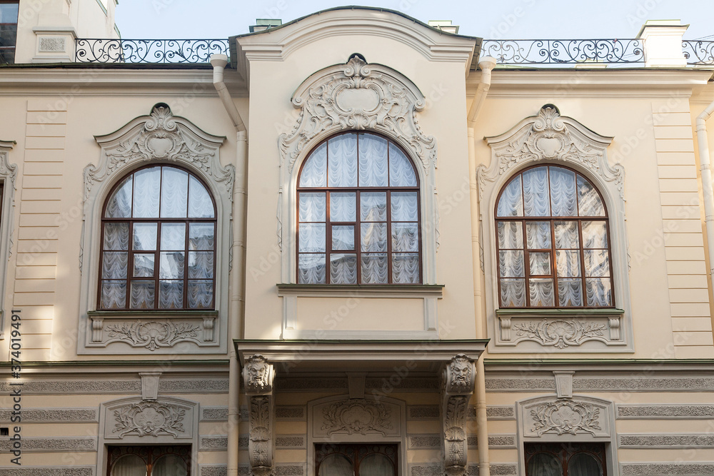 Balcony of an old noble house with stucco molding in saint petersburg