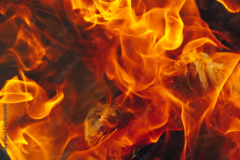 blazing fire background with tongues of flame blazing fire background with tongues of flame