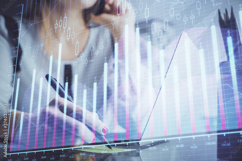 Double exposure of woman hands typing on computer and financial graph hologram drawing. Stock market analysis concept. Double exposure of woman hands typing on computer and financial graph hologram drawing. Stock market analysis concept.