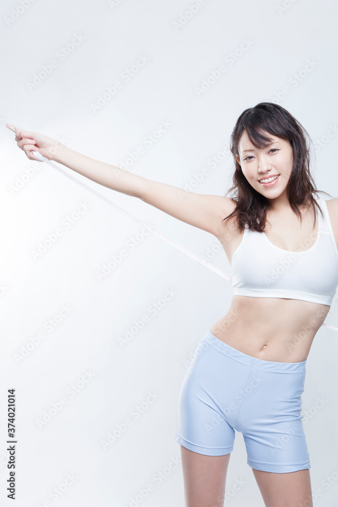 メジャーを持つ女性 メジャーを持つ女性