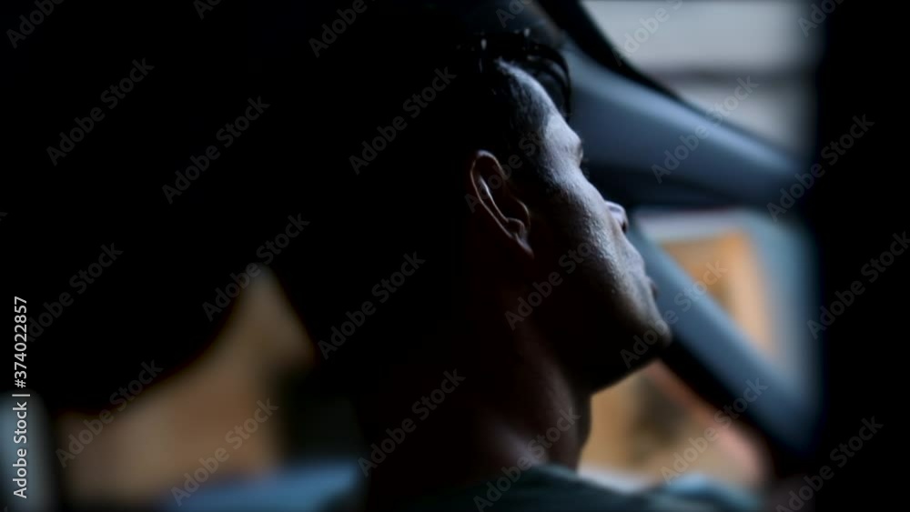 Man driving car, back of driver Man driving car, back of driver