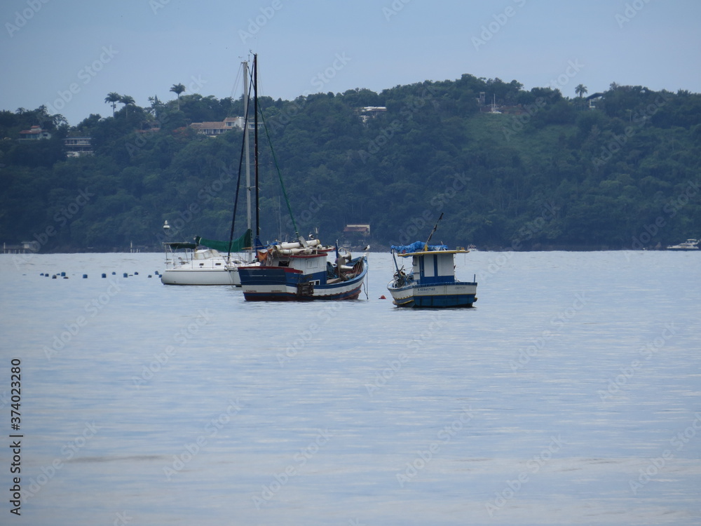 Fishing boat in flat sea