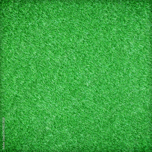 Green artificial grass texture background