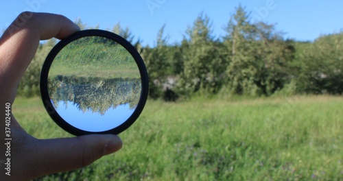 camera lens in the field for perspective