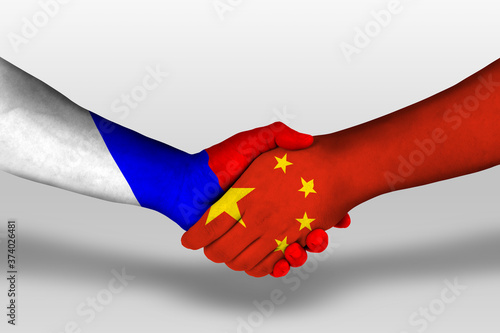 Photography Handshake between china and russia flags painted on hands, illustration with clipping path