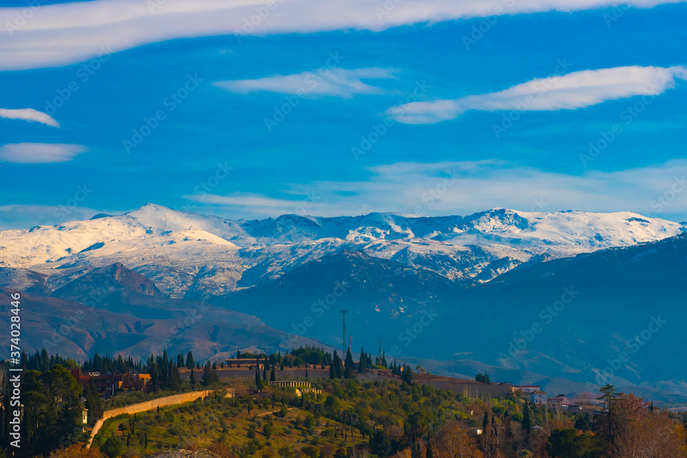 Panoramic view of Sierra Nevada with  green forest