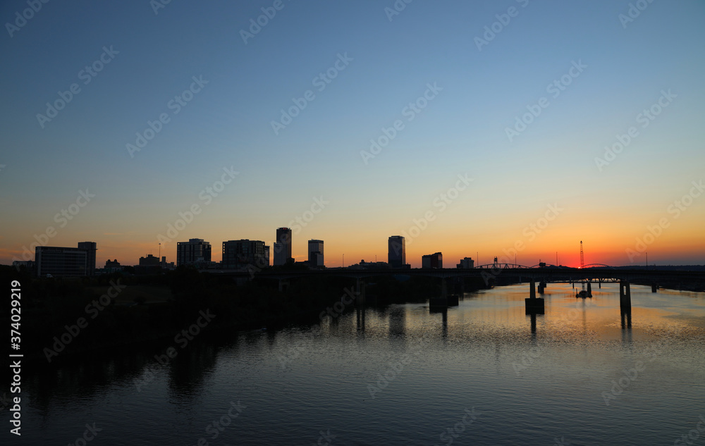 Skyline along the river at sunset Skyline along the river at sunset