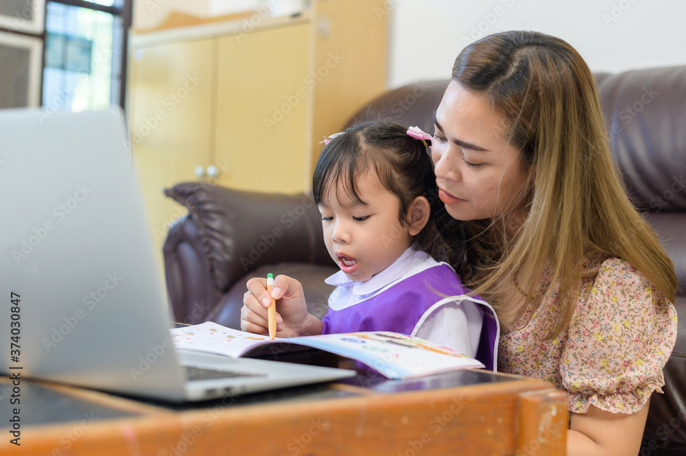 Mother and daughter do homework teaching Mother and daughter do homework teaching
