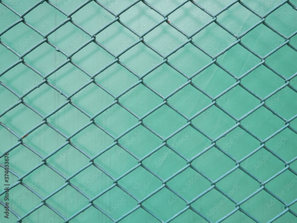 green metal fence wire texture background. green metal fence wire texture background.