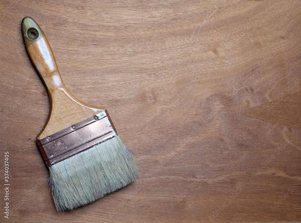 paint brush on horizontal wooden background paint brush on horizontal wooden background