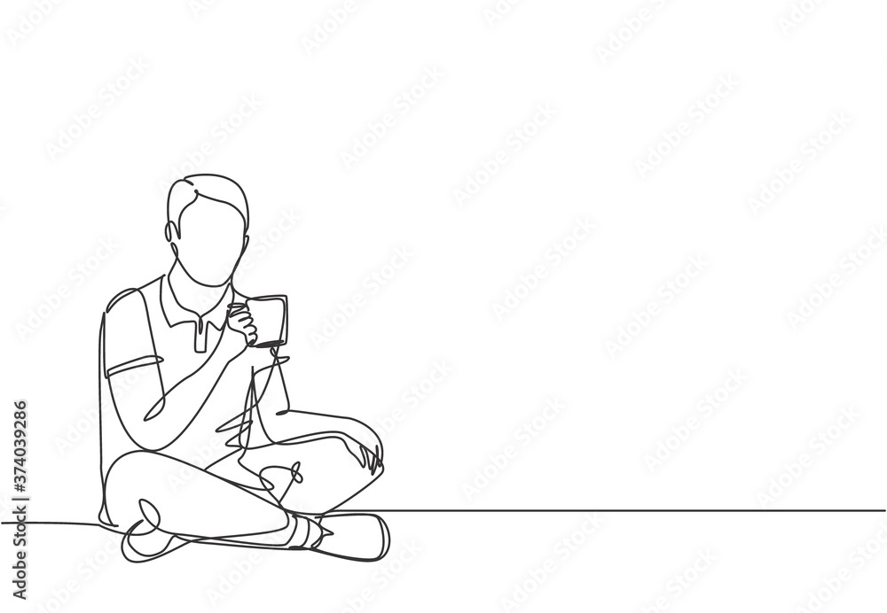 One continuous line drawing of young happy attractive worker sitting on the floor while holding a cup of coffee and thinking some ideas. Drinking tea concept graphic design vector illustration