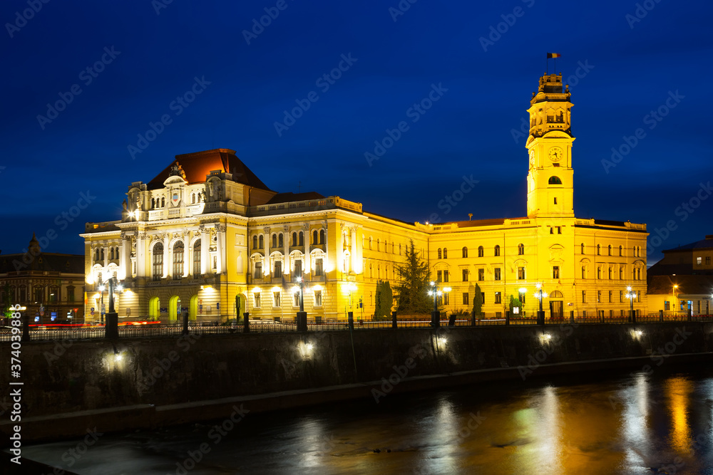 Oradea City Hall and quay in night lights, Romania.