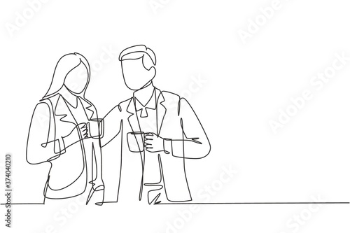 One single line drawing of young male and female office workers pose together while holding a cup of coffee. Work office life concept. Continuous line draw design vector illustration