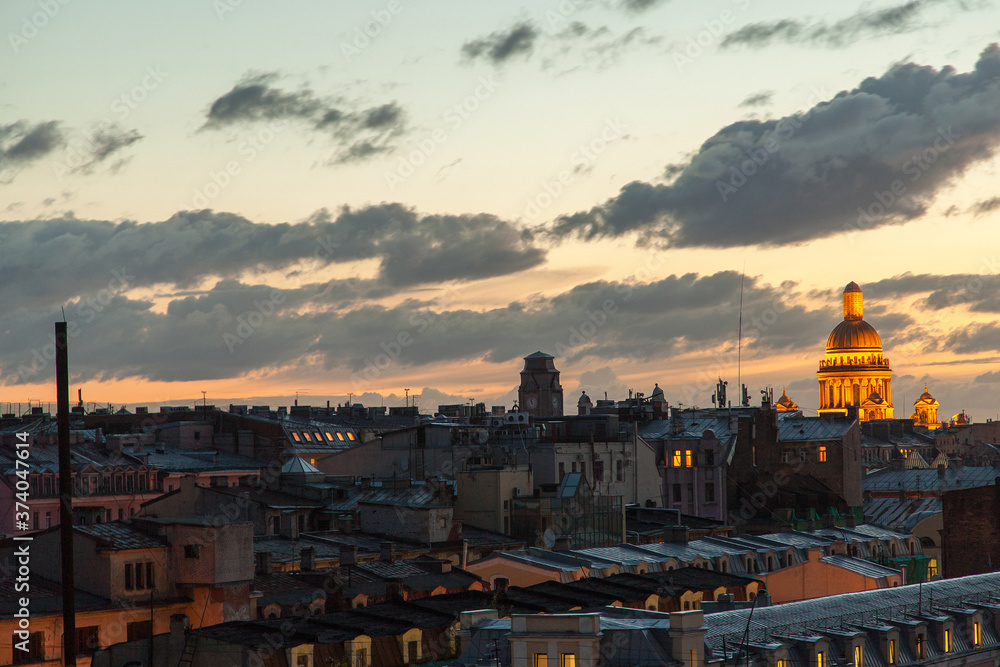 Fototapeta premium Saint Petersburg rooftop cityscape in time of sunset with view on Saint Isaac's cathedral